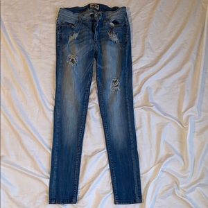 mid rise ripped skinny jeans